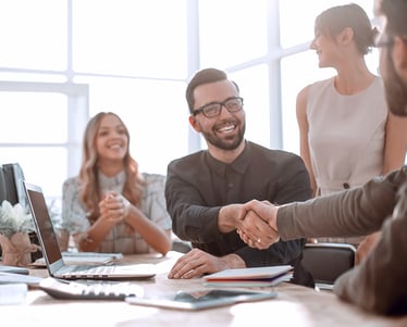  Business partners shaking hands