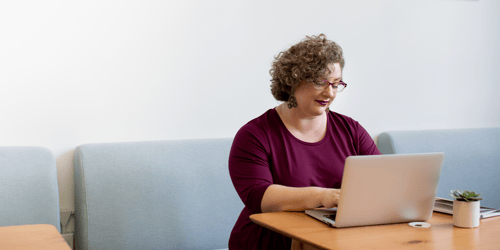 Woman on a computer doing research 