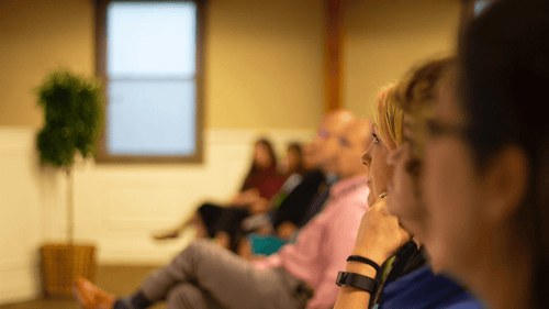 People face forward focusing on a seminar