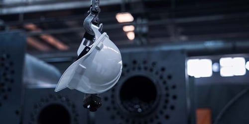 Worker's safety helmet placed in a hazardous work zone. 