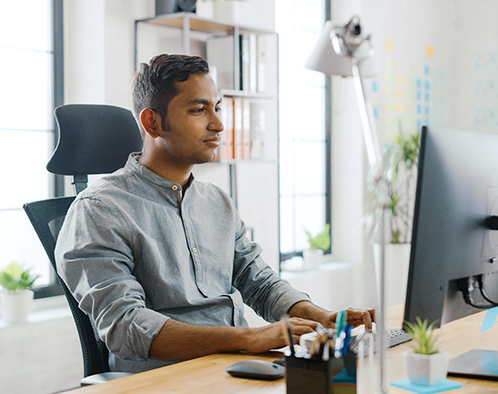 Developer concentrating at his desk