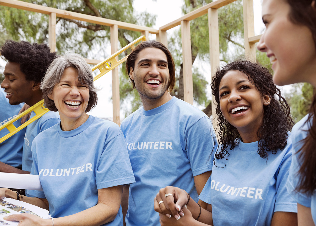 A group of volunteers building a structure