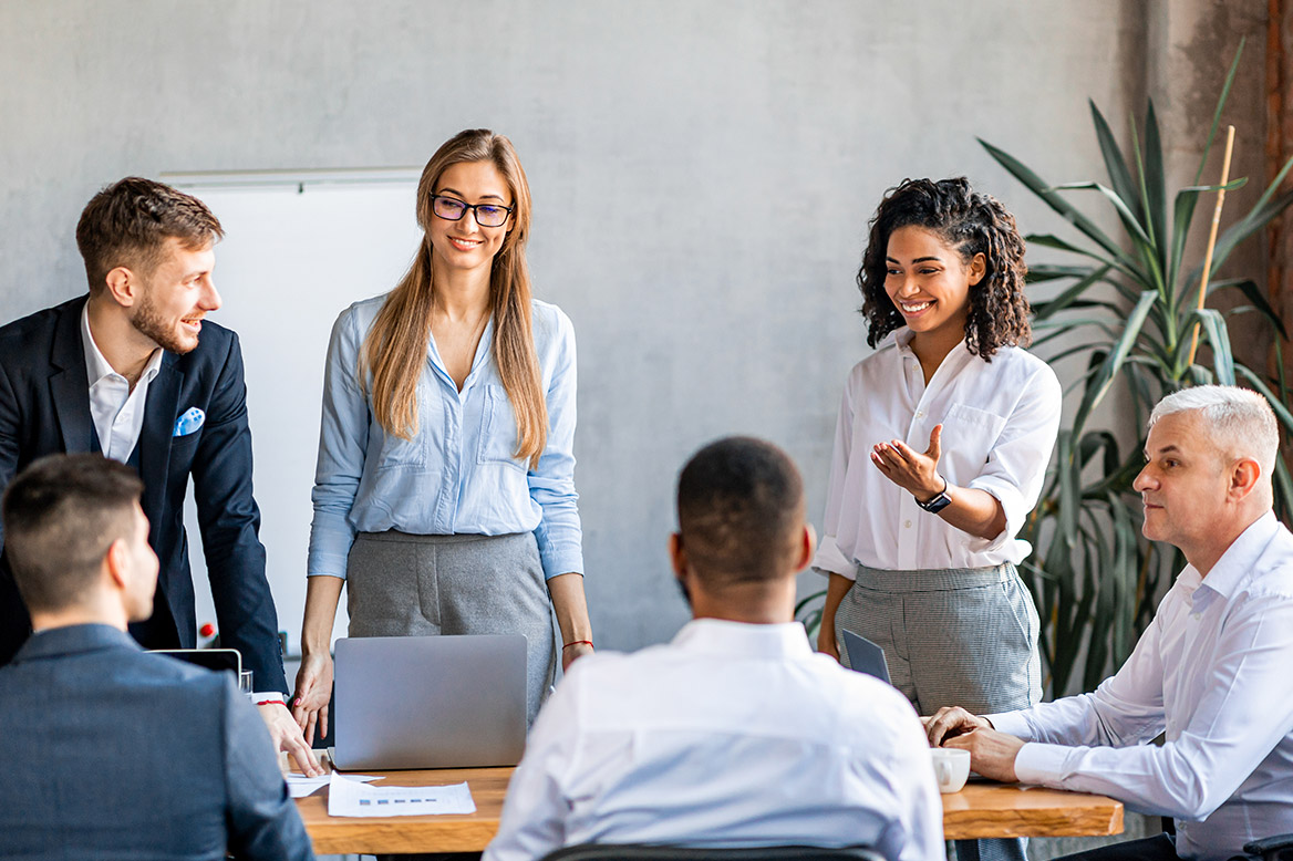 Corporate team meeting at a conference table