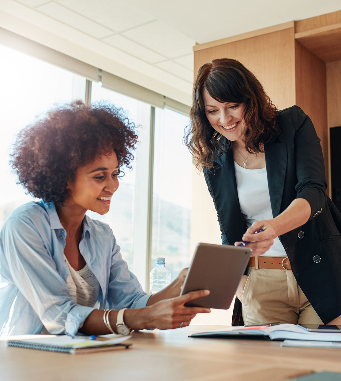 Small business owners using a tablet