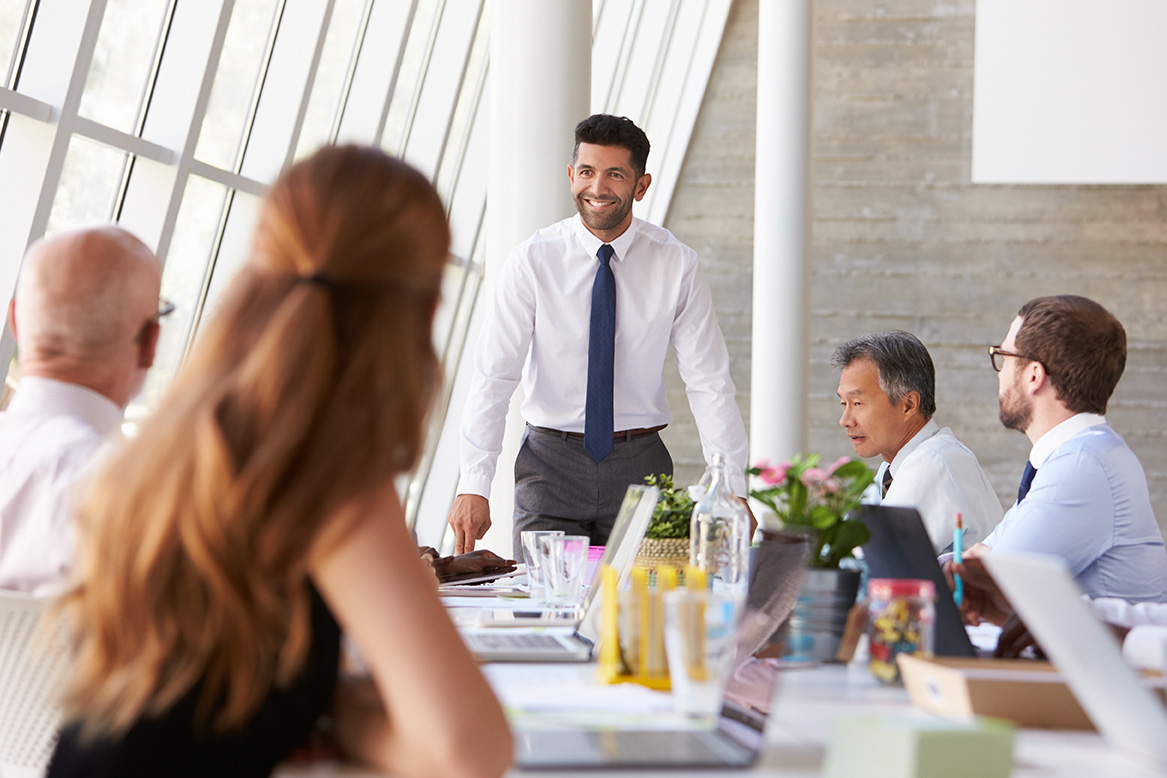 Office worker leading a team meeting